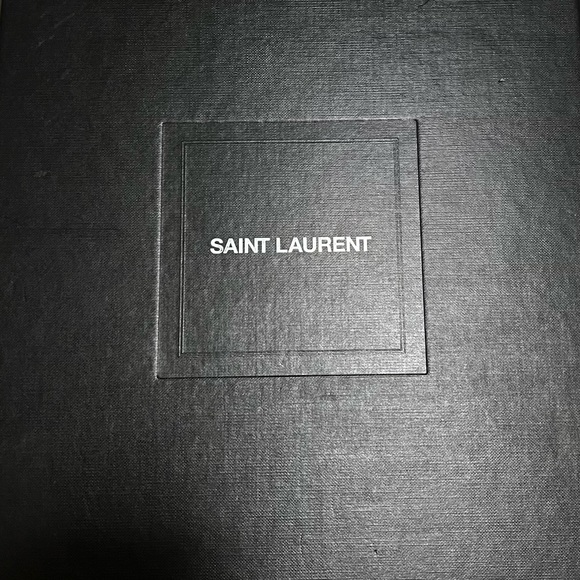 Brand new Yves Saint Laurent brown high heels. YSL is the heel on these shoes. - Picture 7 of 8